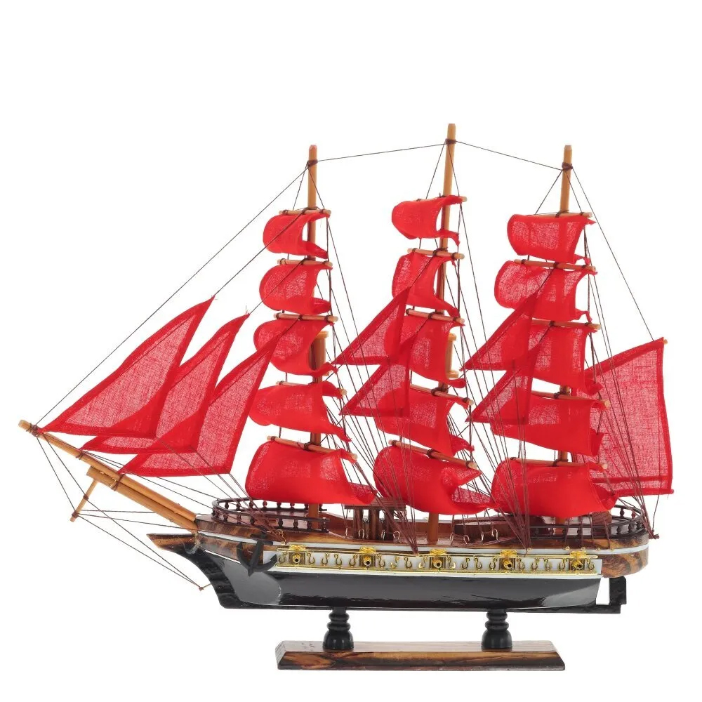 

Декоративная модель деревянного парусника с красными парусами в подарочной упаковке With The low